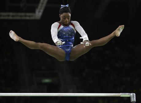 United States Simone Biles performs on the uneven bars during the artistic gymnastics women's individual all-around final at the 2016 Summer Olympics in Rio de Janeiro Brazil Thursday Aug. 11 2016