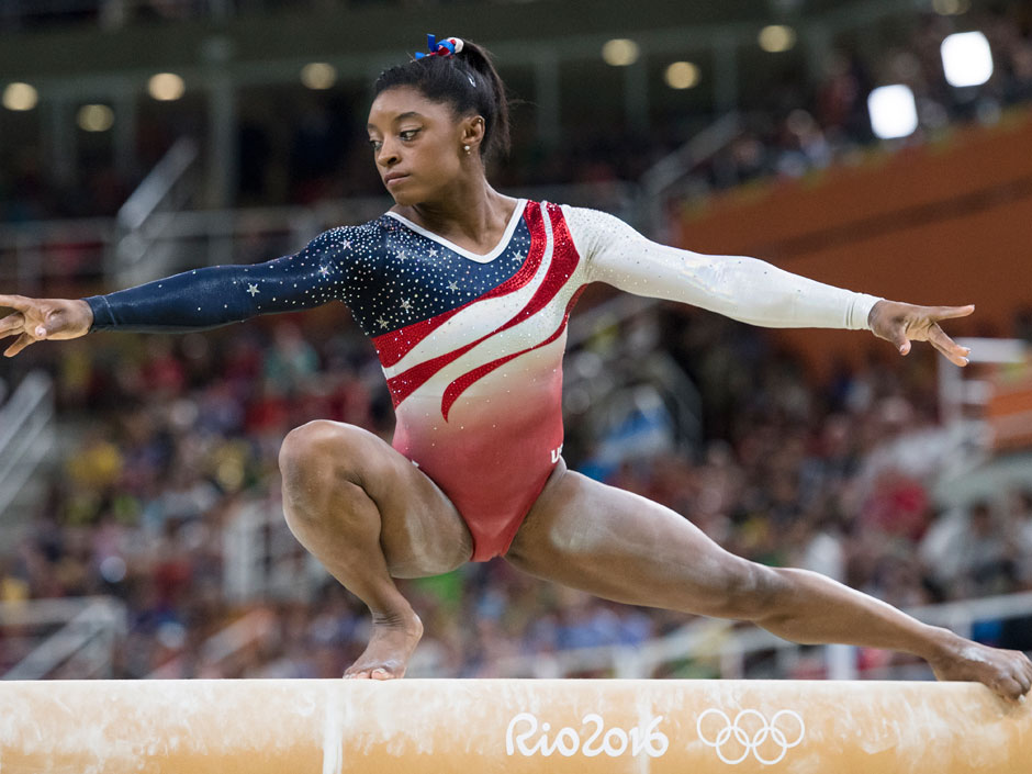 Simone Biles competes in the women's team all-around gymnastics event