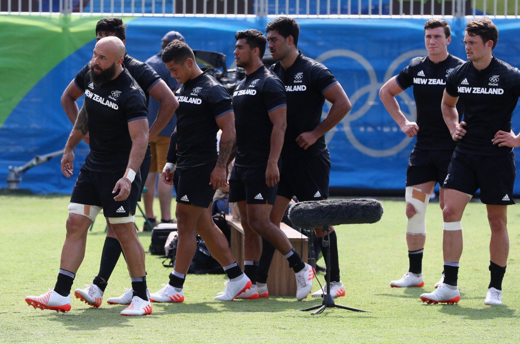 RIO DE JANEIRO BRAZIL- AUGUST 09 New Zealand players look dejected in defeat after the Men's Rugby Sevens Pool C match between New Zealand and Japan on Day 4 of the Rio 2016 Olympic Games at Deodoro Stadium