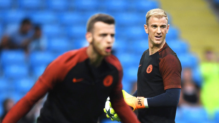 Hart looks on as team-mate Angus Gunn warms