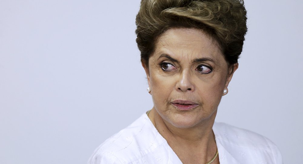 Brazil's President Dilma Rousseff looks on during signing of federal land transfer agreement for the government of the state of Amapa at Planalto Palace in Brasilia Brazil