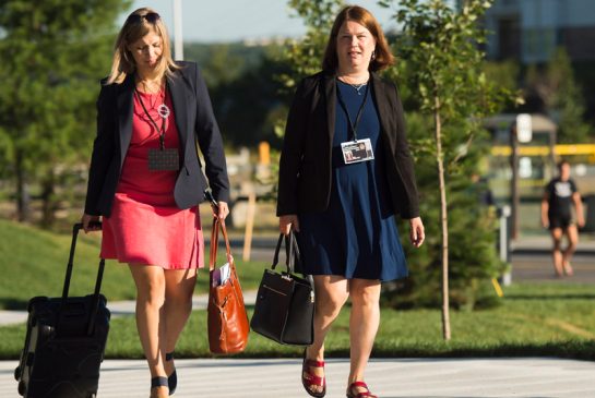 Federal Health Minister Jane Philpott right and her Chief of Staff Genevieve Hinse left arrive for the Liberal cabinet retreat in Sudbury Ont. on Monday