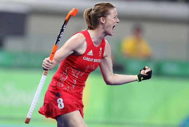 Helen Richardson Walsh celebrates scoring a penalty stroke against New Zealand