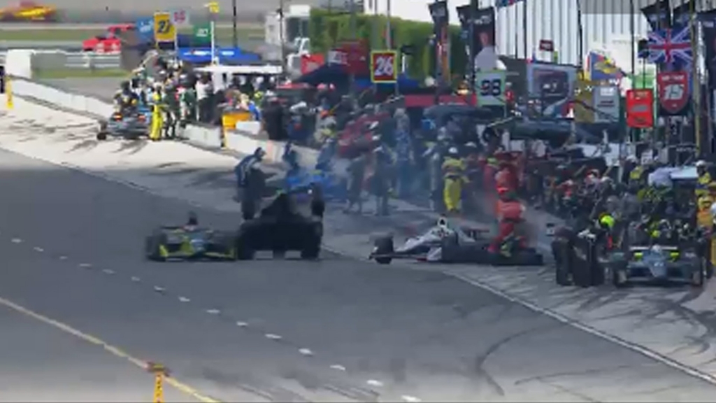 Helio Castroneves Alexander Rossi and Charlie Kimball were involved in a bizarre pit road accident on Lap 63