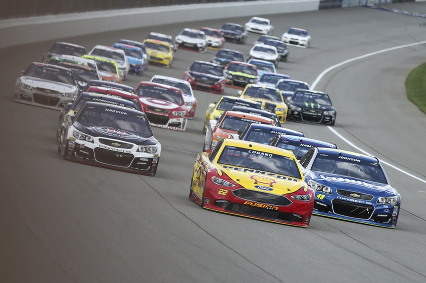 Aug 28 2016 Brooklyn MI USA Sprint Cup Series driver Joey Logano leads Sprint Cup Series driver Jimmie Johnson as the race begins during the Pure Michigan 400 at the Michigan International Speedway. Mandatory Credit Aaron Doster-USA TODAY