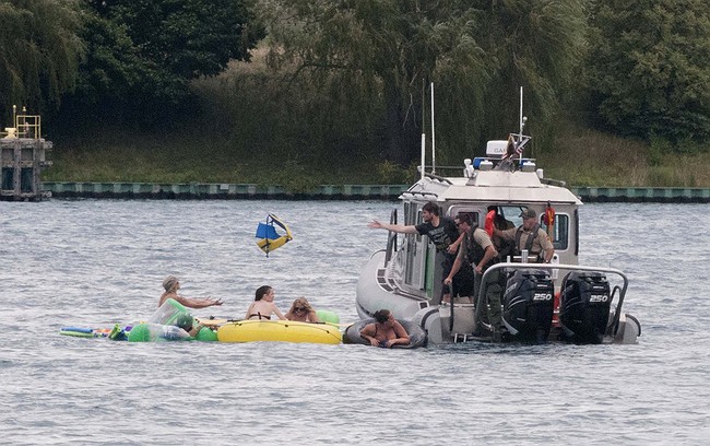 Wind blows Americans in Port Huron Float Down across to Canada