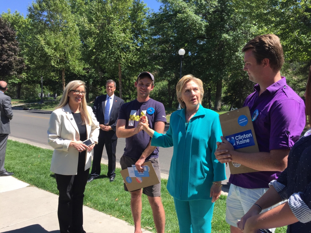 Hillary Clinton meets with local organizers and Mayor Hillary Schieve outside of Hub Coffee Roasters