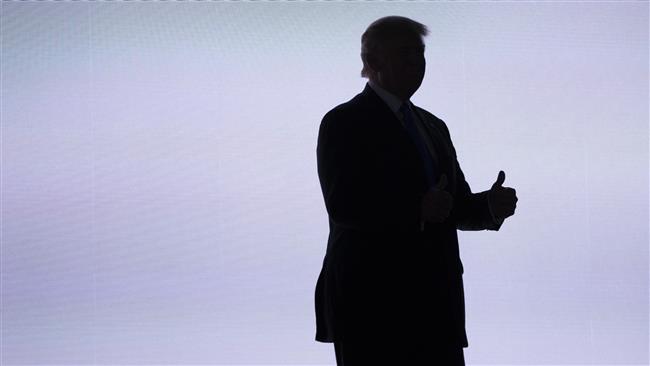 US Republican presidential candidate Donald Trump gives a thumbs up as he arrives to introduce his wife Melania during the Republican National Convention on July 18 in Cleveland Ohio