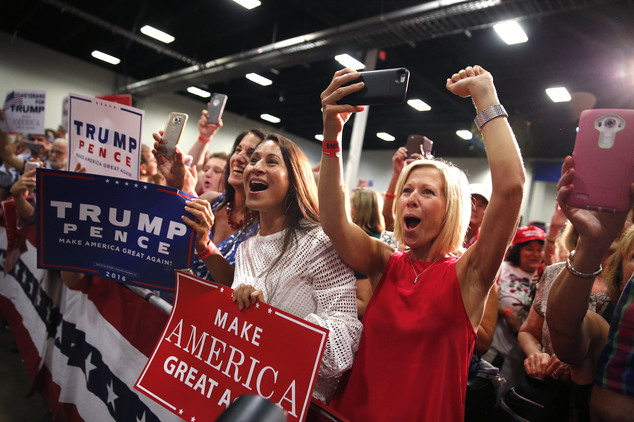 Supporters cheer as Republican presidential candidate Donald Trump arrives to speak at a campaign rally in Fredericksburg Va. Saturday Aug. 20 2016. (AP