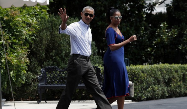 As the presidential contenders fight it out in key states President Barack Obama and First Lady Michelle Obama walk