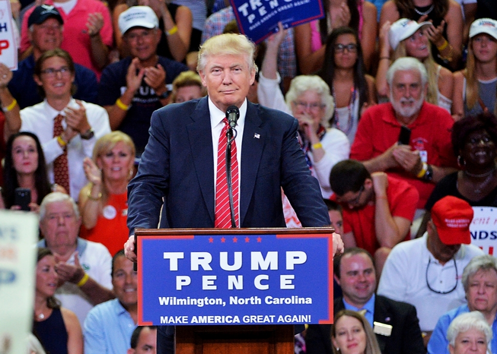 Republican presidential candidate Donald Trump addresses the audience during a campaign event at Trask Coliseum