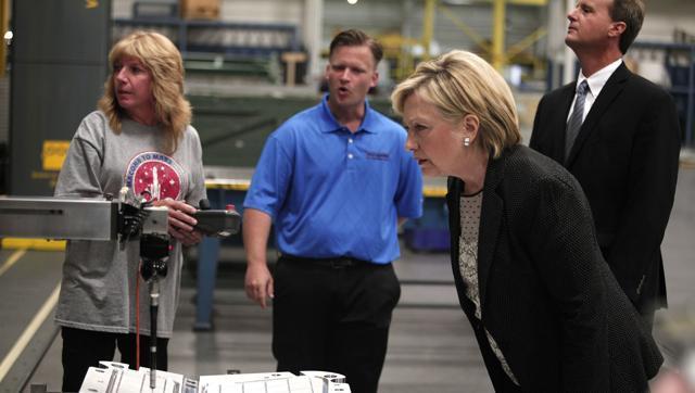 Hillary Clinton tours a factory in Warren Michigan before giving a speech there on the U.S. economy