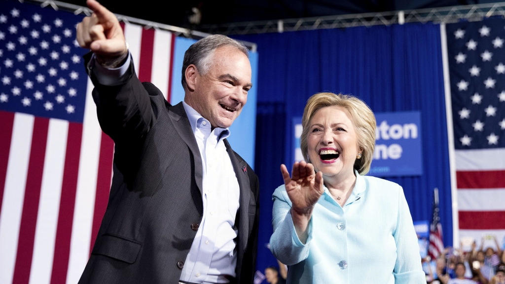 Hillary Clinton with Tim Kaine whom she has chosen as her running mateAP