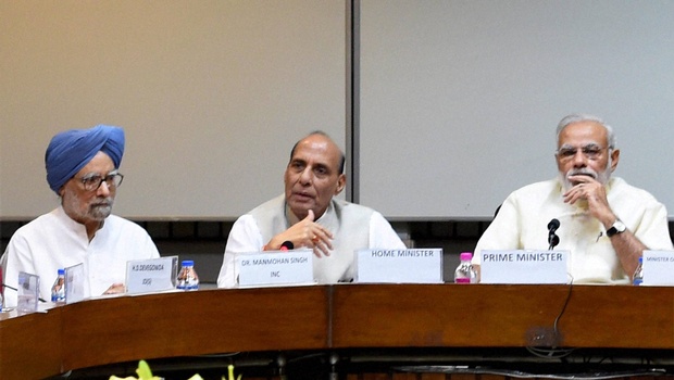 Prime Minister Narendra Modi with Union Home Minister Rajnath Singh and Former Prime Minister Manmohan Singh during an all party meeting on Kashmir situation at Parliament in New Delhi on Friday