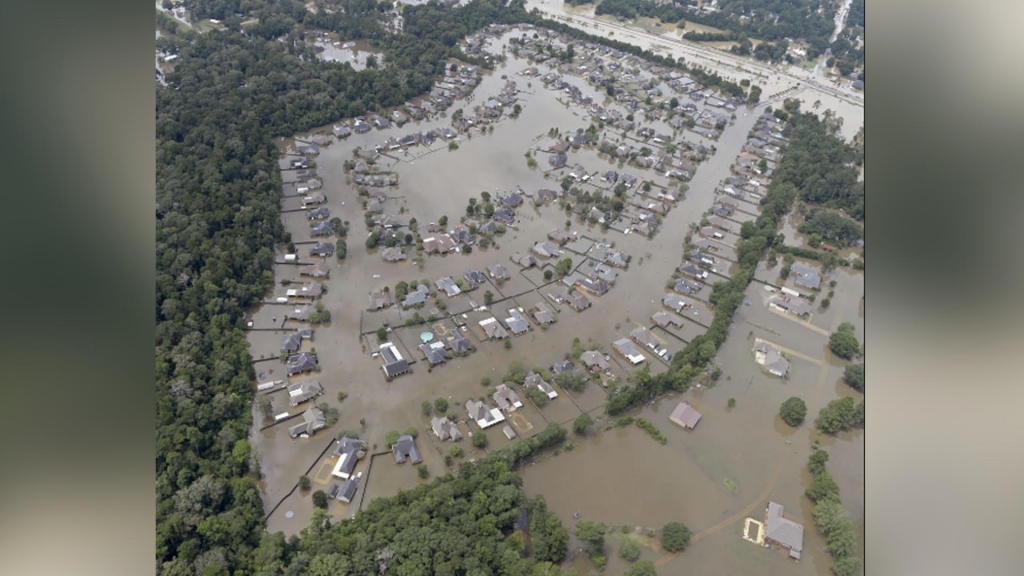 Houses take on water in the Watson area during severe flooding in Livingston Parish on Sunday