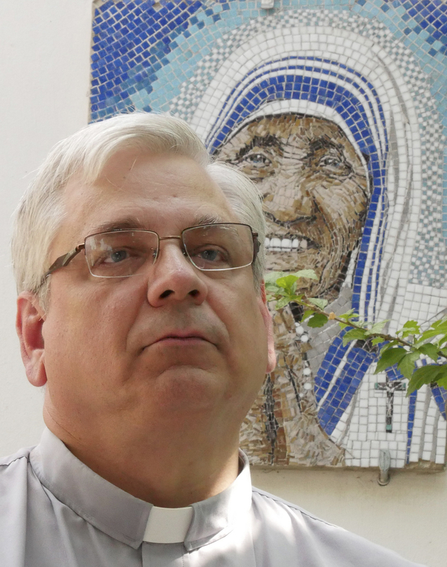 Rev. Brian Kolodiejchuk postulator of the cause of beatification and canonization of Mother Teresa is interviewed by the Associated Press in front of a mos