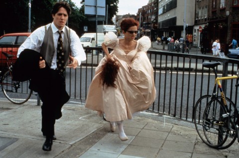 Hugh Grant and Charlotte Coleman in the 1994 film “Four Weddings and a Funeral.”