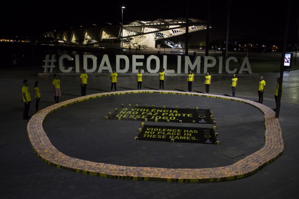 Human right activists protest against violence ahead of the Olympic Games in Rio de Janeiro Brazil Thursday