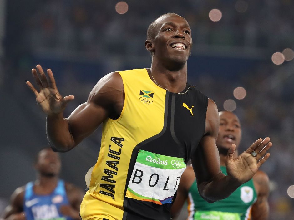 Usain Bolt smiles after crossing the line in first place in the men's 100 metres on Sunday night in Rio