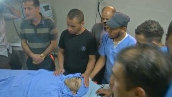 The body of Muhammad Abu Hashhash lays at the Hebron hospital after he was shot by Israeli forces in the Fawwar refugee camp in the West Bank Aug. 16 2016