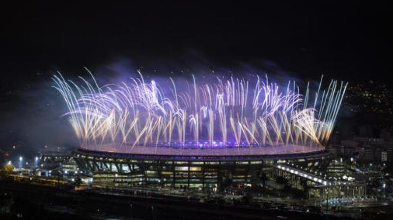 The athletes braved harsh winter winds accompanied by torrential showers to sing dance and take selfies during the nearly three-hour-long closing ceremony