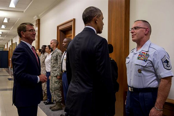 President Barack Obama and Defense Secretary Ash Carter thank service members after an Aug. 4 news conference at the Pentagon