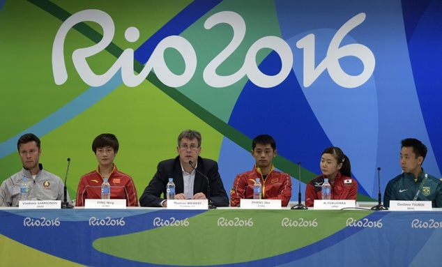 ITTF president Thomas Weikert gives a press conference with table tennis competitors in Rio de Janeiro