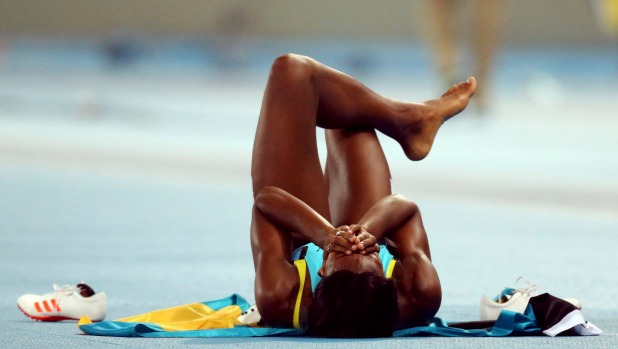 Shaunae Miller is overcome with emotion after winning the 400m gold medal