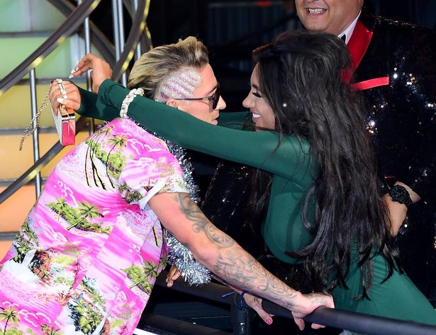 Stephen Bear celebrates winning with Chloe Khan during the live final of Celebrity Big Brother at Elstree Studios London