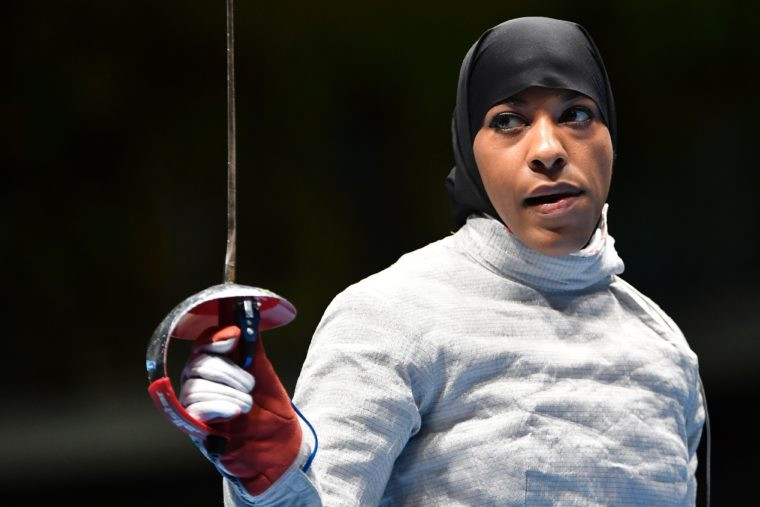 Ibtihaj Muhammad competing in the sabre event