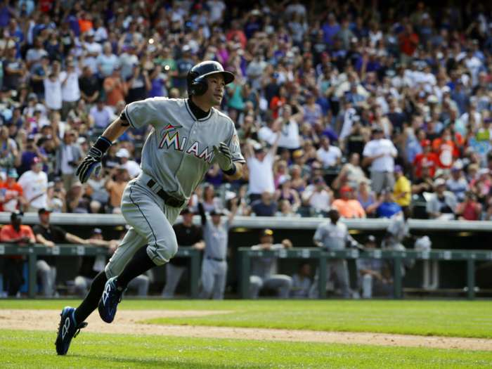 Miami Marlins&#039 Ichiro Suzuki rums after getting a triple for the 3,000th hit of his major league career in the seventh inning of a baseball game against the Colorado Rockies in Denver Sunday Aug. 7 2016. Associated Press