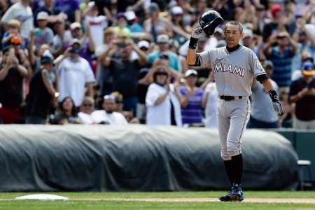 Aug 7 2016 Denver CO USA Miami Marlins center fielder Ichiro Suzuki acknowledges the fans after hitting a triple in the seventh inning against the Colorado Rockies at Coors Field. Mandatory Credit Isaiah J. Downing-USA TODAY Sports