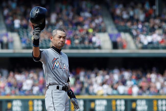 Miami Marlins&#039 Ichiro Suzuki acknowledges the crowd after tripling off Colorado Rockies relief pitcher Chris Rusin in the seventh inning of a baseball game Sunday Aug. 7 2016 in Denver. The hit was the 3,000th in his Major League career. (AP