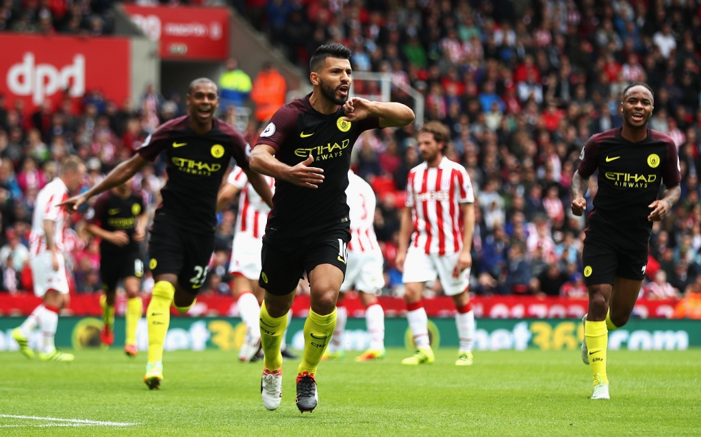 STOKE ON TRENT ENGLAND- AUGUST 20 Sergio Aguero of Manchester City celebrates scoring his sides first goal during the Premier League match between Stoke City and Manchester City at Bet365 Stadium