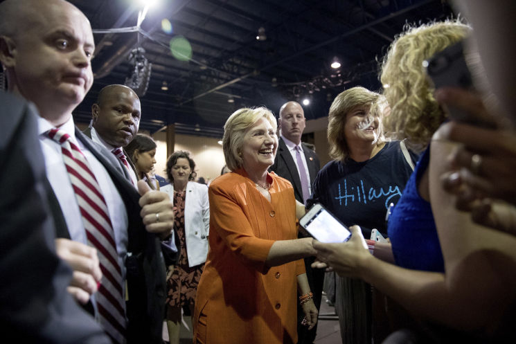 Democratic presidential candidate Hillary Clinton greets members of the audience after speaking at a rally Monday at Osceola Heritage Park in Kissimmee