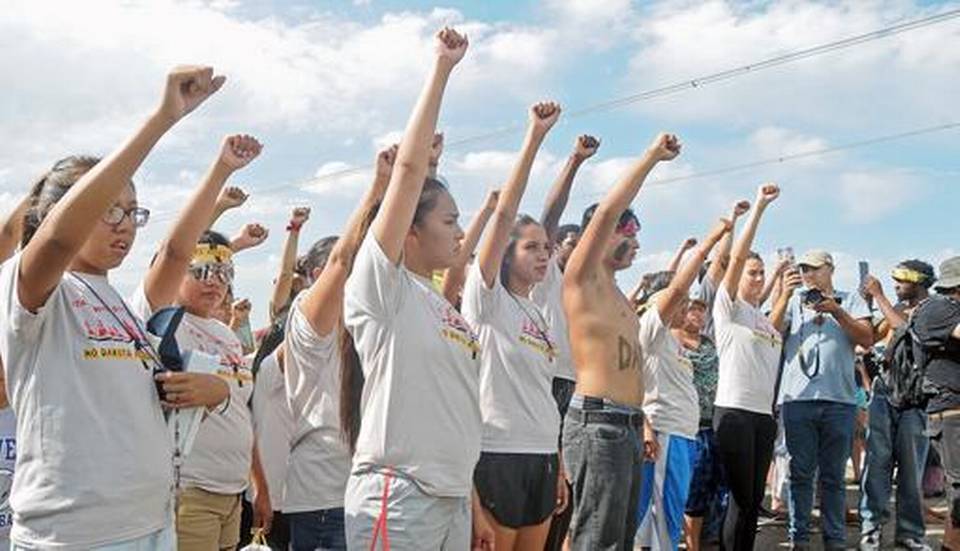 People against the Dakota Access Pipeline chant in opposition on Thursday Aug. 11 2016 at a site where a roadway was being constructed to begin the process of building the pipeline. The pipeline would start in North Dakota and pass through South Dakota