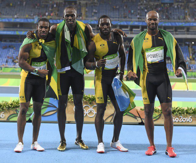 RIO DE JANEIRO BRAZIL- AUGUST 19 Yohan Blake Usain Bolt Nickel Ashmeade and Asafa Powell of Jamaica which won the mens 4x100m relay final during the on Day 14 Athletics of the 2016 Rio Olympics at Olympic Stadium