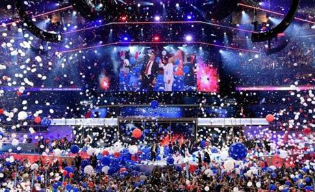 Balloons come down on Democratic presidential nominee Hillary Clinton and running mate Tim Kaine at the end of the fourth and final night of the Democratic National Convention at Wells Fargo Center