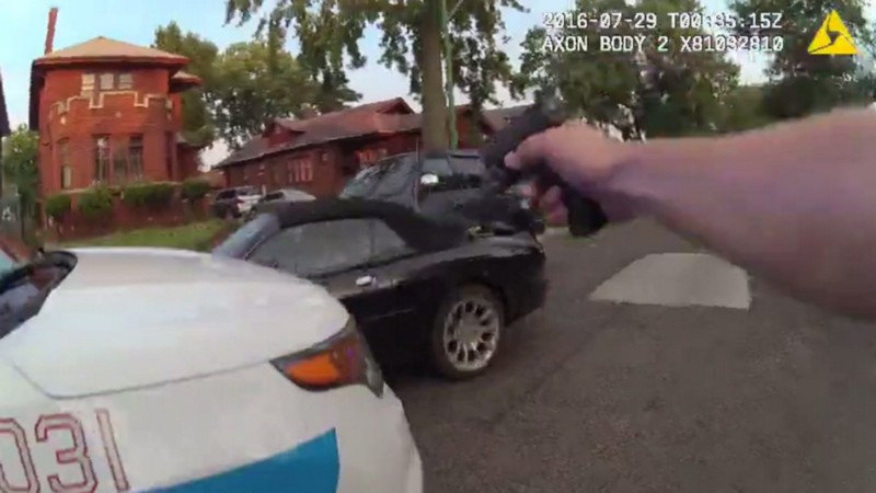 In this video screengrab an officer can be seen open fire into a car driven by Paul O’Neal. CREDIT SCREENSHOT