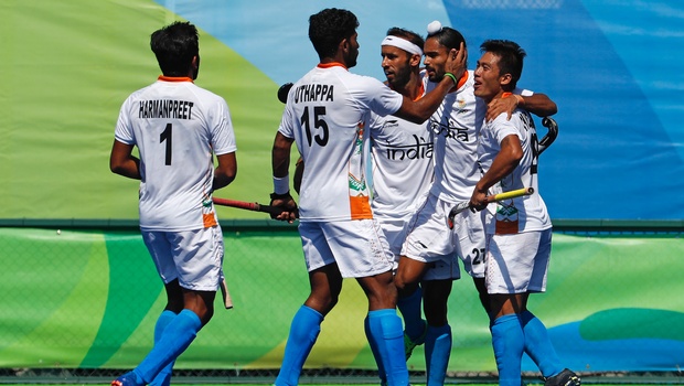 Players from India celebrates after scoring against Belgium during a men's field hockey quarter final match at the 2016 Summer Olympics in Rio de Janeiro Brazil