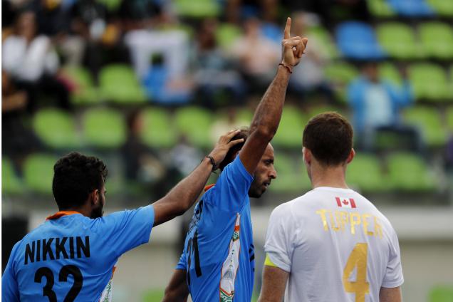 Ramandeep celebrates after scoring against Canada