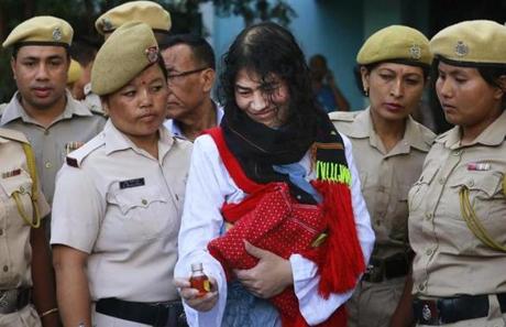 Irom Sharmila shown Tuesday with the bottle of honey she used to end her protest has targeted what she says are abuses by India’s military