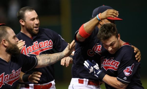 Cleveland Indians Tyler Naquin right s mobbed