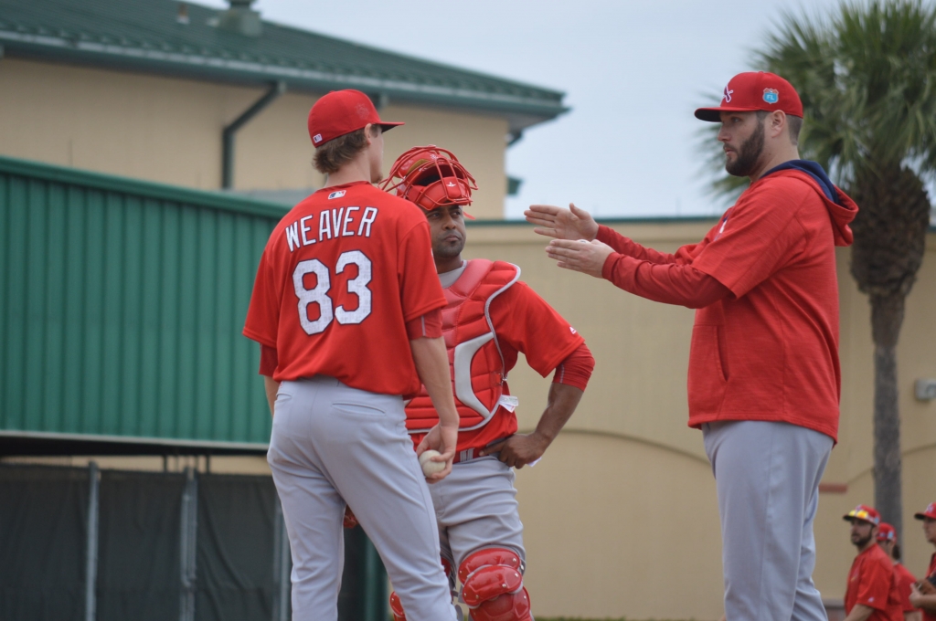 Injured Cardinals pitcher Lance Lynn advises minor leaguer Luke Weaver at Spring Training complex in Jupiter Florida