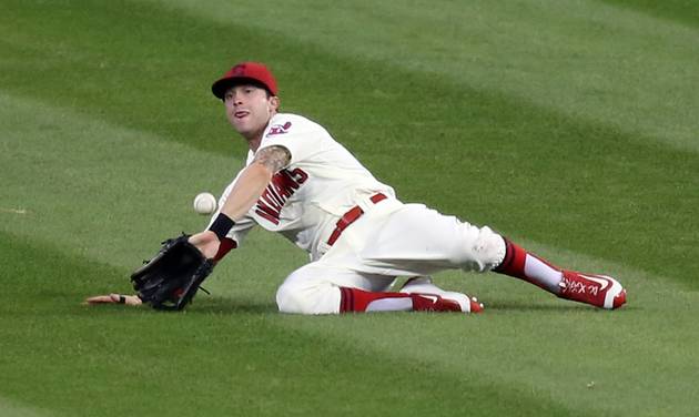 Cleveland Indians&#039 Tyler Naquin is unable to make a sliding catch on a ball hit by Toronto Blue Jays Devon Travis during the eighth inning of a baseball game Saturday Aug. 20 2016 in Cleveland