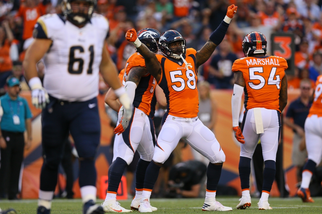 DENVER CO- AUGUST 27 Outside linebacker Von Miller #58 of the Denver Broncos celebrates a first quarter sack against the Los Angeles Rams at Sports Authority Field Field at Mile High