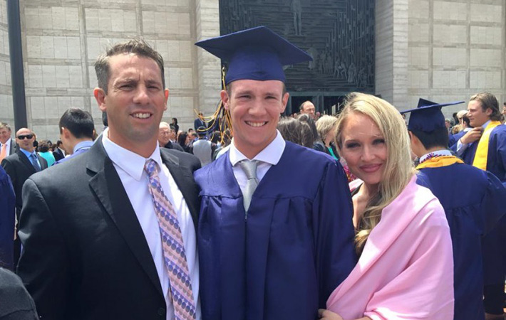 Calvin Riley at his high school graduation. The college sophomore and baseball player was shot dead Saturday night in what appears to be a horrific random attack