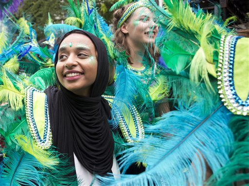 Dancers perform during the Children's Day parade at the Notting Hill Carnival in west London Sunday Aug. 28 2016