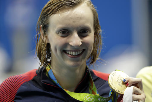 United States&#039 Katie Ledecky holds the gold medal after the women's 200-meter freestyle during the swimming competitions at the 2016 Summer Olympics Tuesday Aug. 9 2016 in Rio de Janeiro Brazil