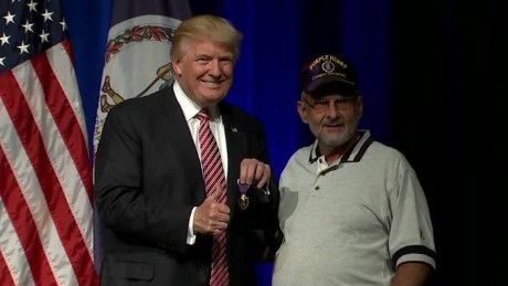 JUST WATCHEDDonald Trump receives Purple Heart from veteranReplayMore Videos...MUST WATCH